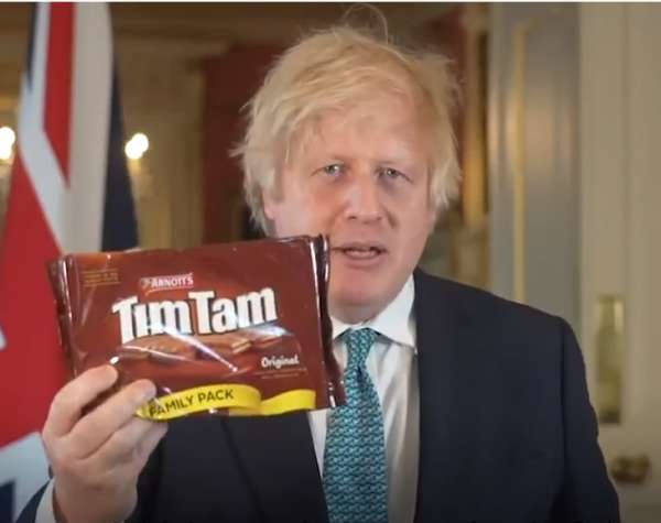 Boris shows Tim Tam biscuit in a short video on Twitter Boris tim tam