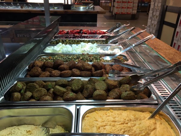 Falafel, hummus and other starters in a food shop Ready made food