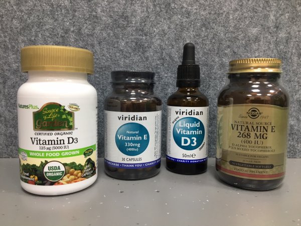 Different brands and forms of vitamins D and E Vitamin D